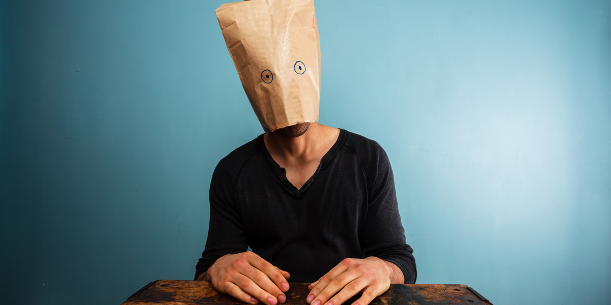 man with bag over his head