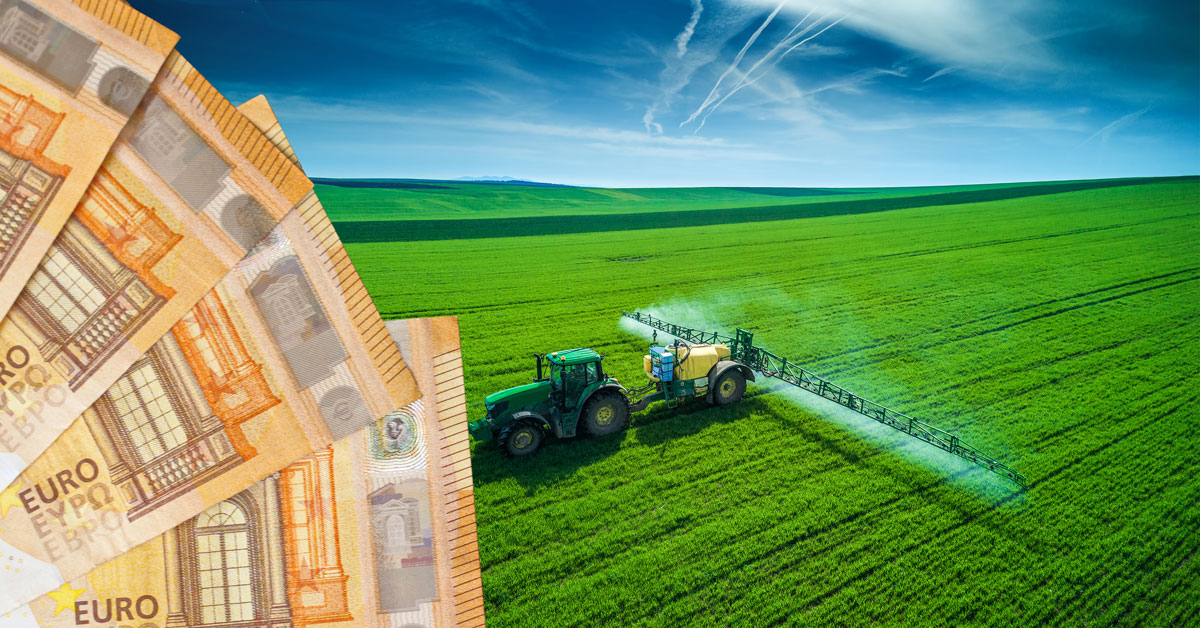 Euros and Tractor spraying pesticides