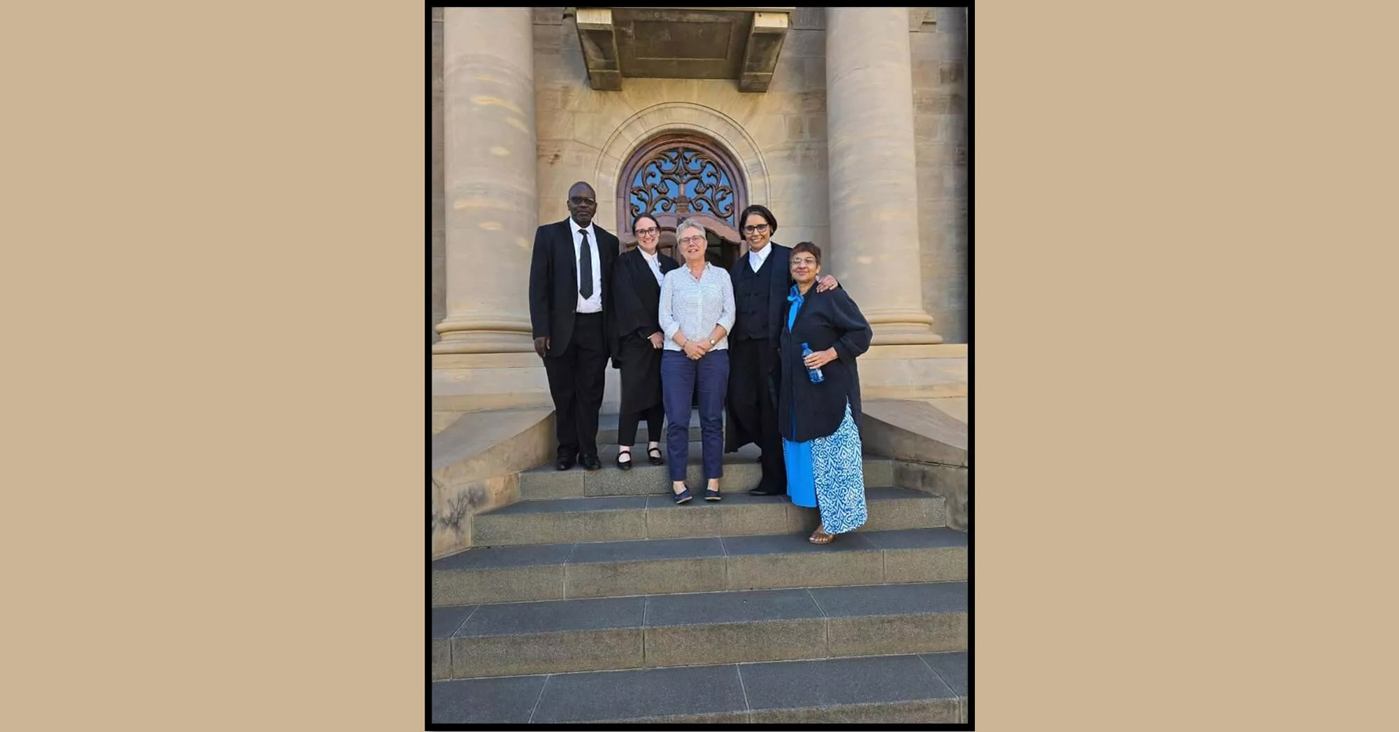 Group at court case stairs