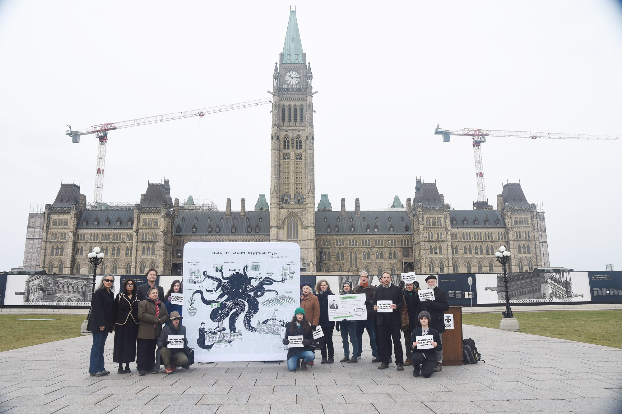 Group with Octopus Map graphic and building