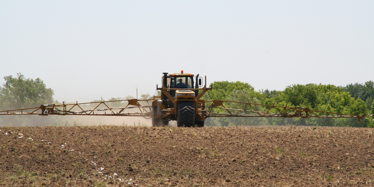 Liquid terragator spreading probable human carcinogen on food crops